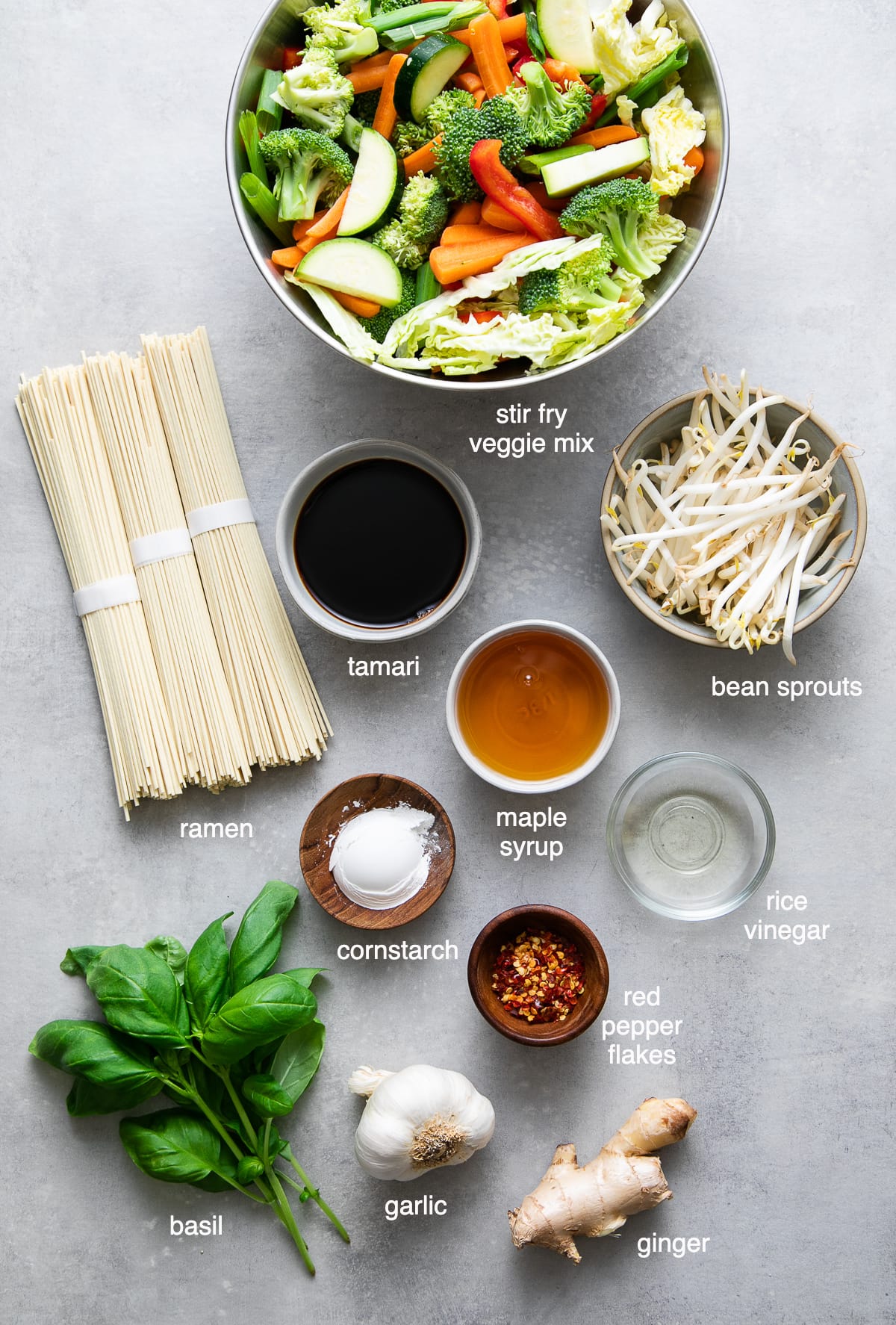 top down view of ingredients used to make ramen noodle stir fry recipe with veggies.