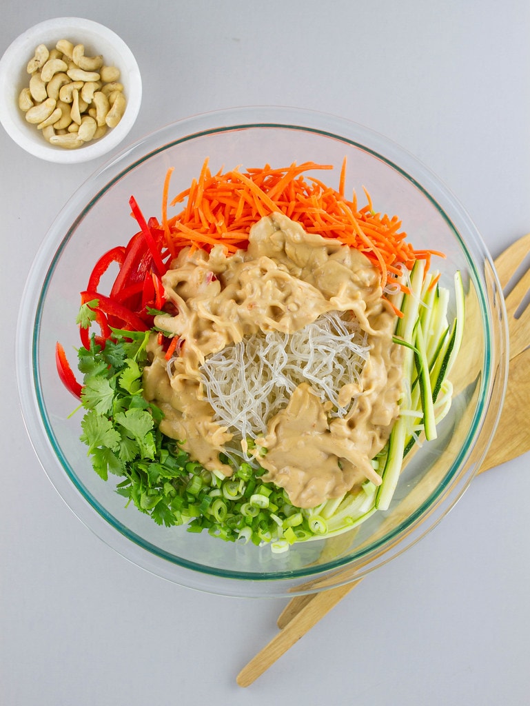 top down view of healthy pad thai with kelp noodles in bowl before mixing.