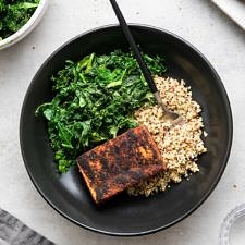 CRISPY BLACKENED TOFU WITH KALE + QUINOA