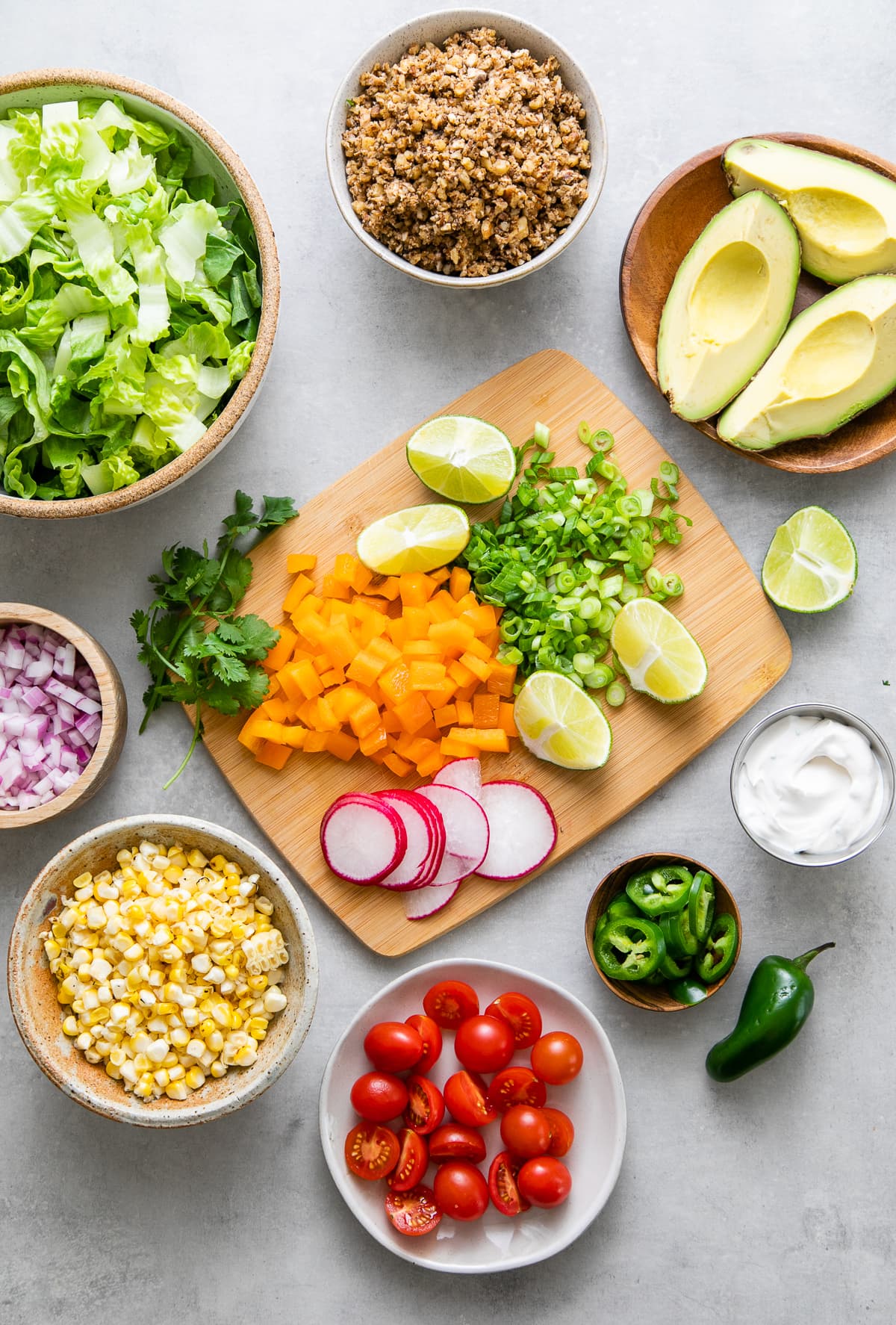 top down view of ingredients used to make the best vegan taco salad with healthy walnut taco meat.