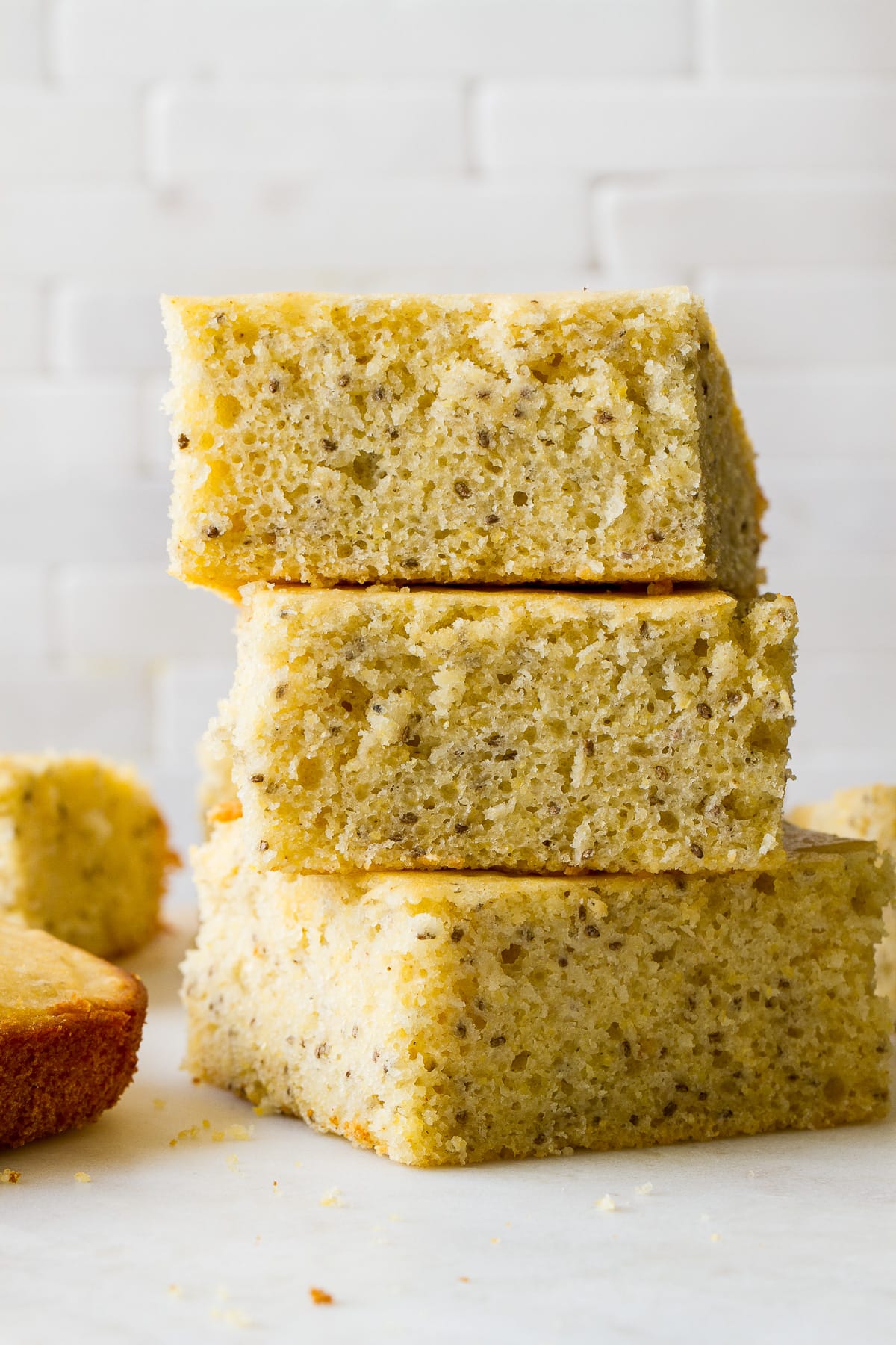 head on view of slices of vegan cornbread stacked.