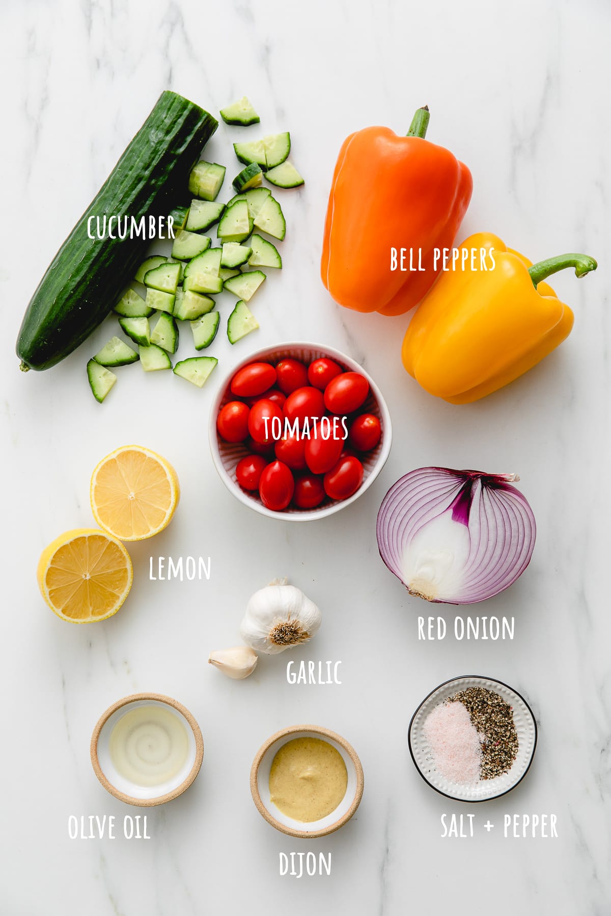 top down view of ingredients used to make chopped vegetable salad recipe.