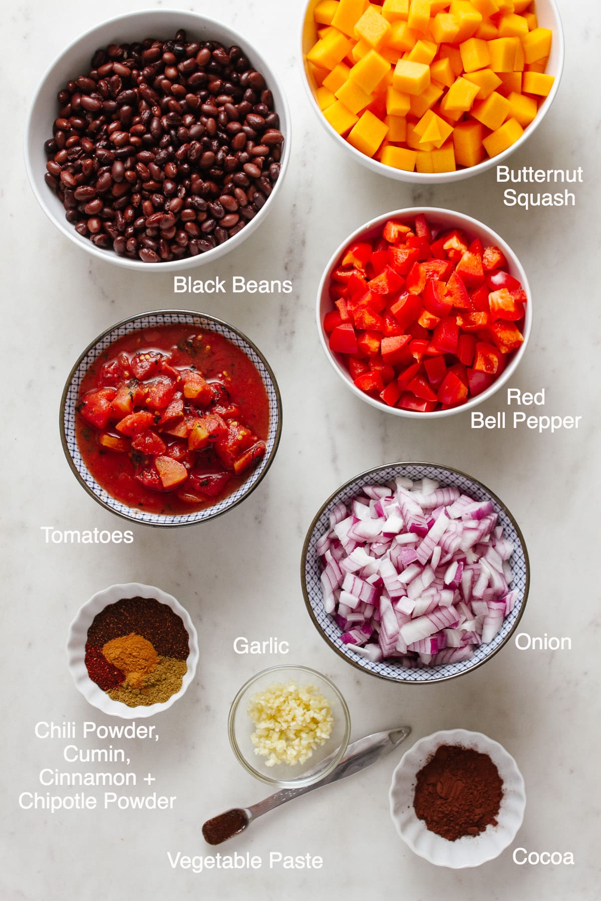 top down view of ingredients needed to make vegan butternut squash chili with black beans.