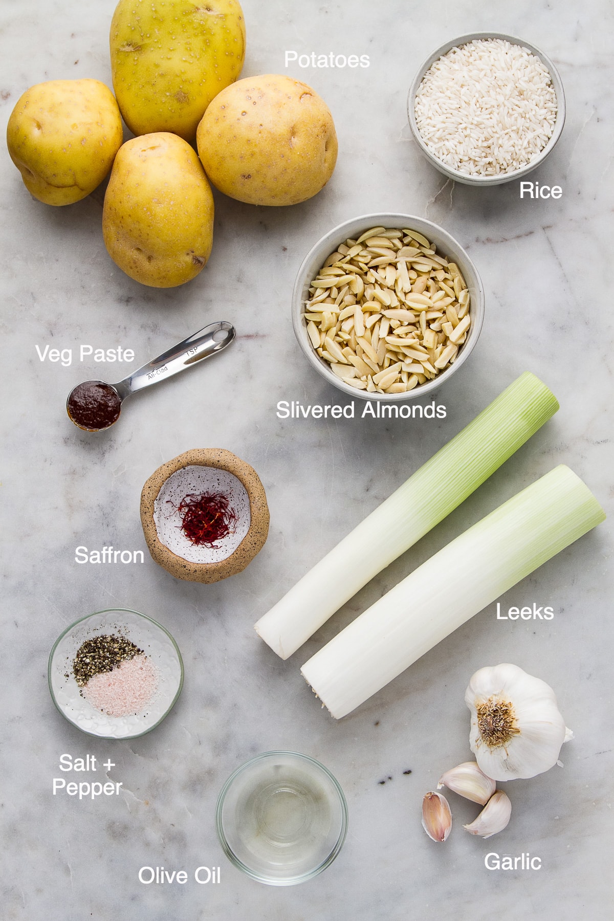 top down view of ingredients used to make potato leek soup with saffron and rice.