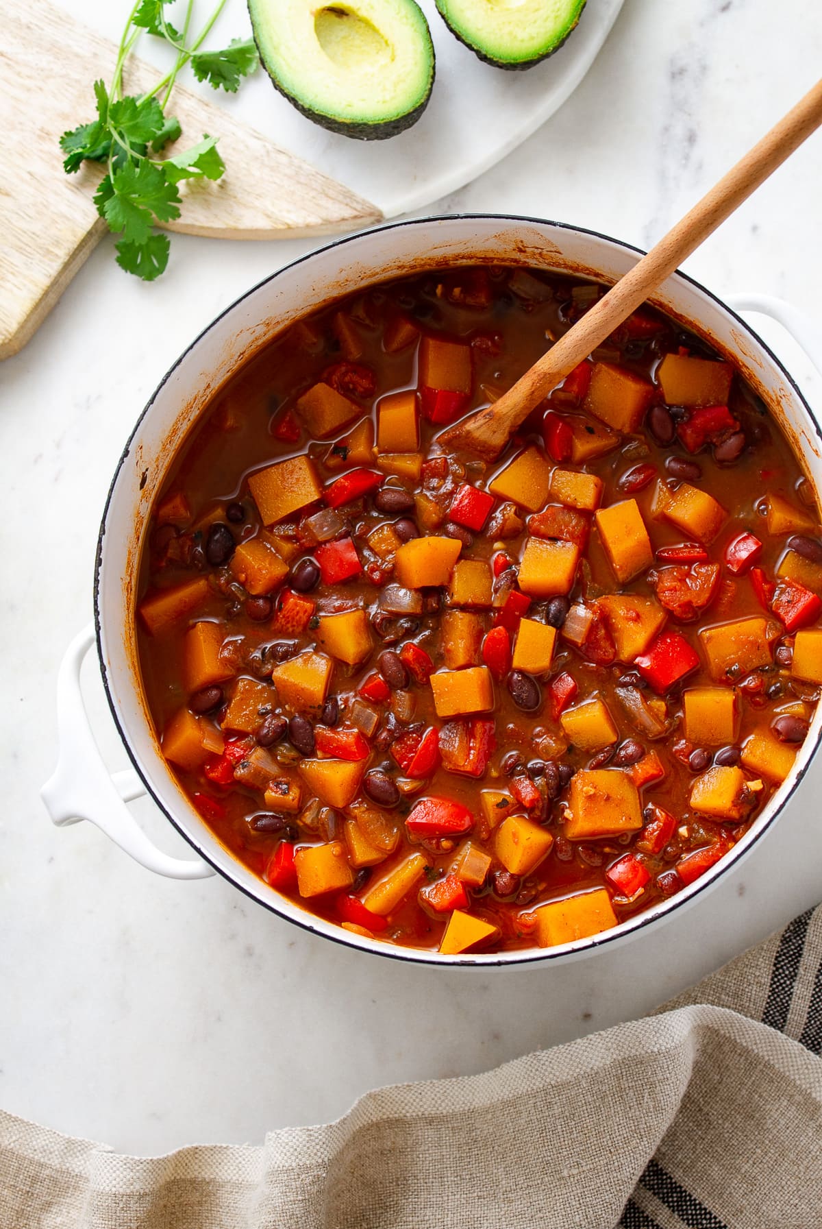 top down view of a freshly made pot of vegan butternut squash with black beans.