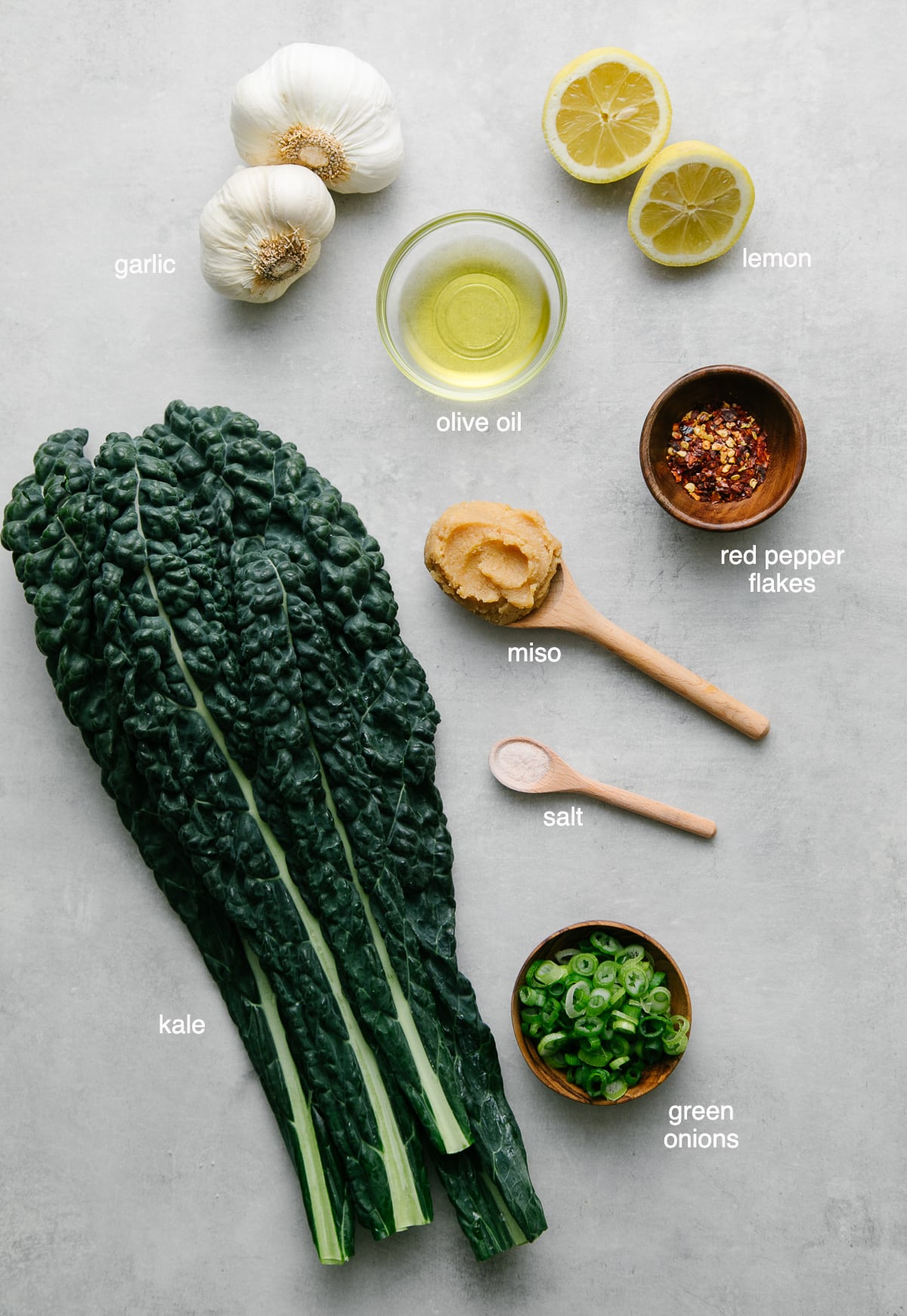 top down view of ingredients used to make vegan miso soup with garlic and kale.