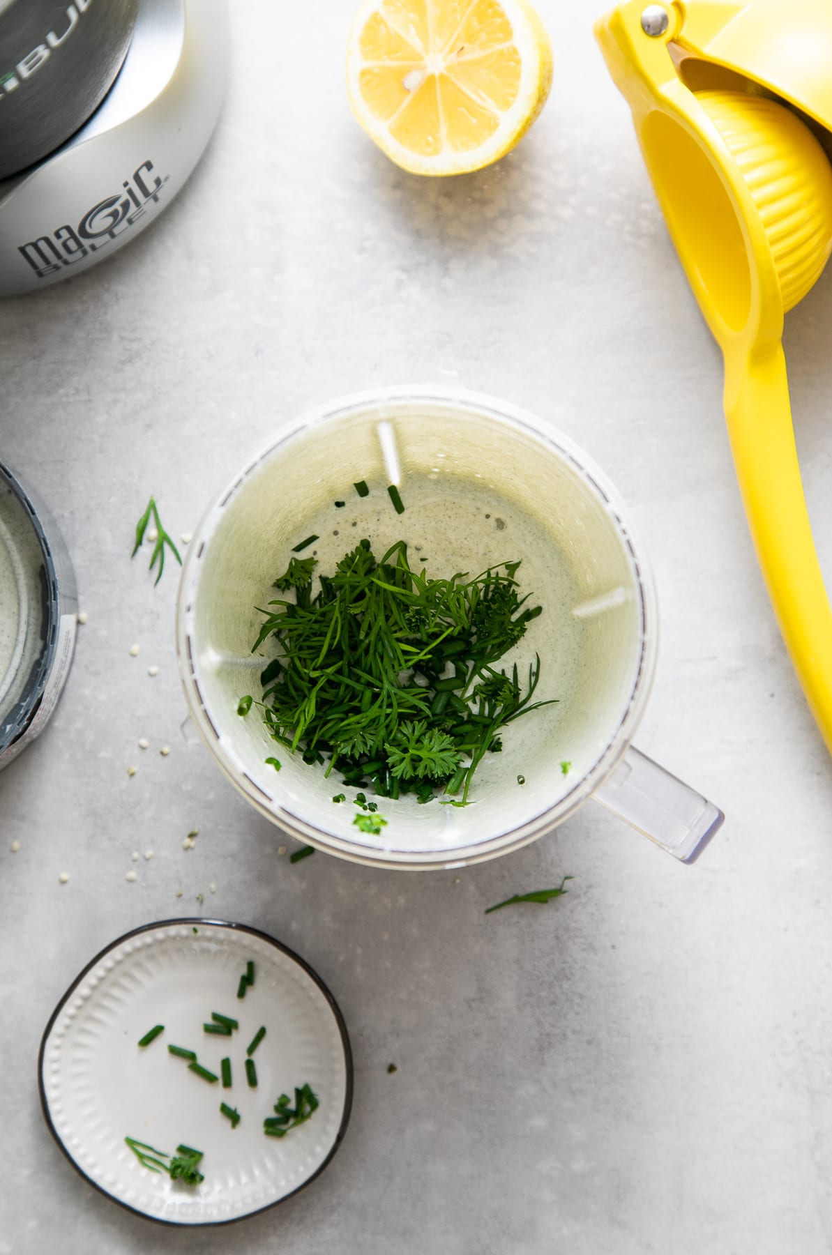 top down view showing the process of making herby hemp seed dressing.