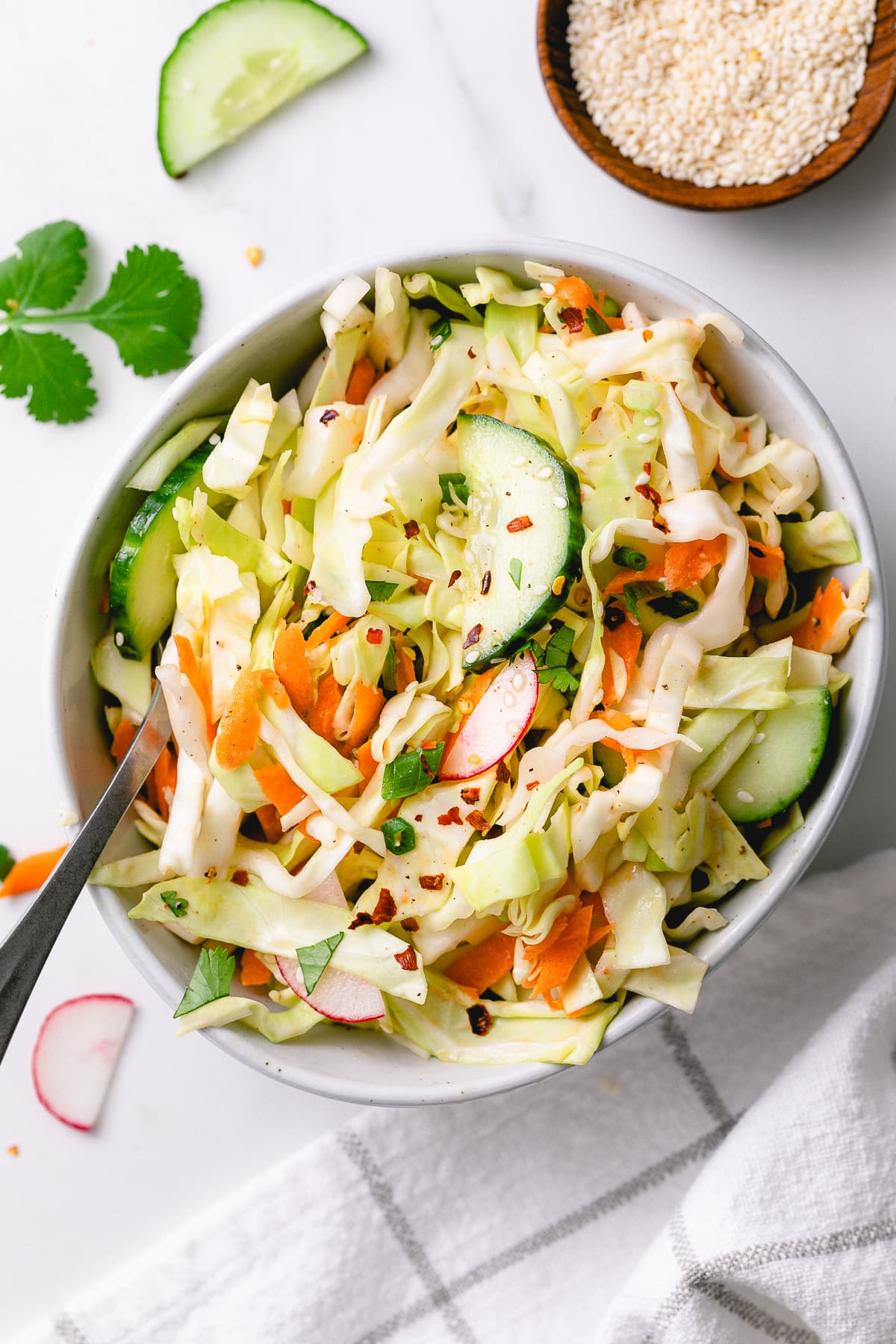 top down view of small bowl with healthy cabbage salad.