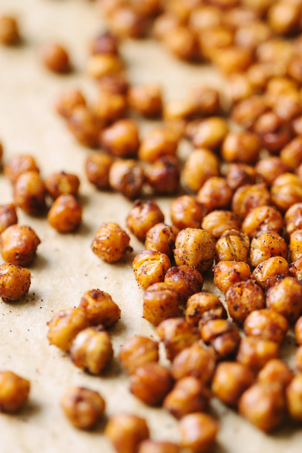 spicy chipotle roasted chickpeas on a baking sheet fresh from the oven