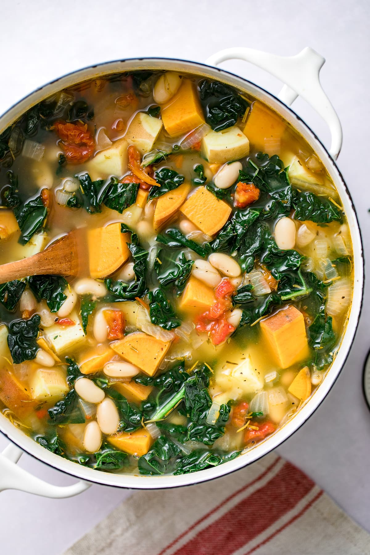 top down view of freshly made pot of sweet potato kale soup.