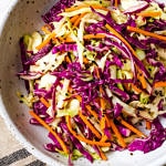 top down view of a serving of asian slaw salad in a bowl.