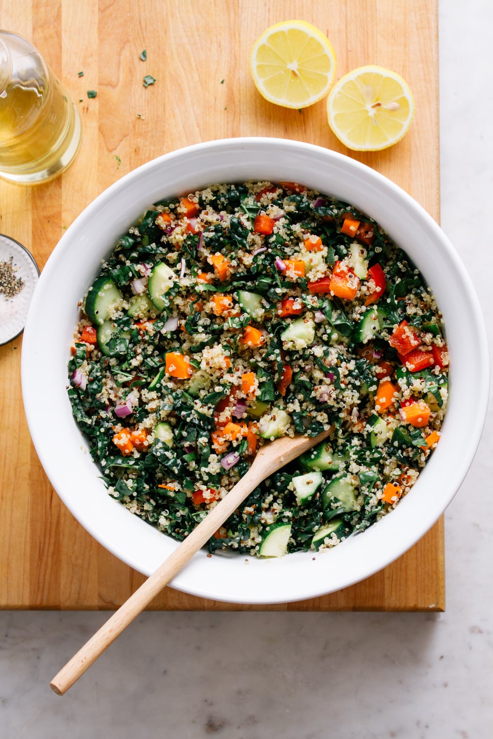 top down view of kale and quinoa salad just mixed and ready to serve or store.