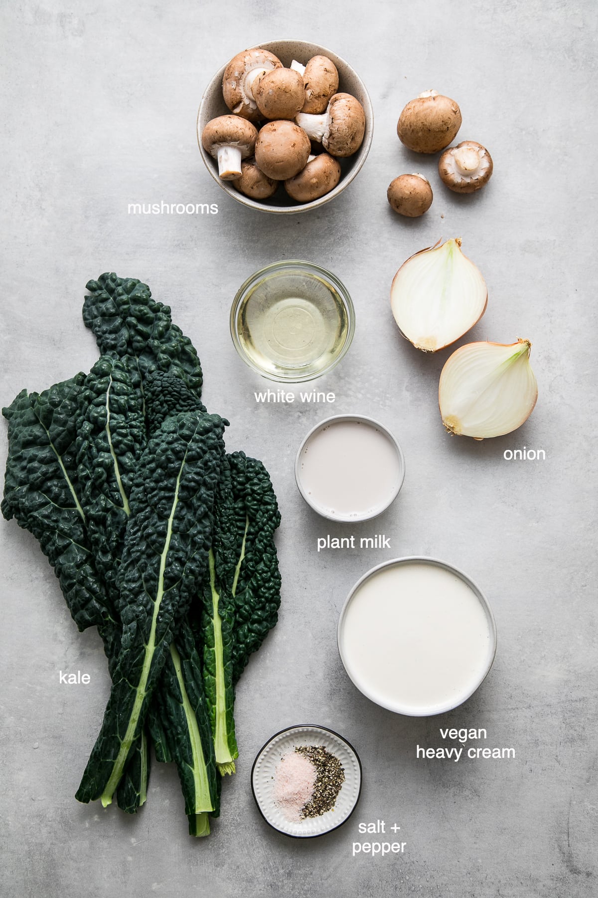 top down view of ingredients used to make kale and mushroom gratin.