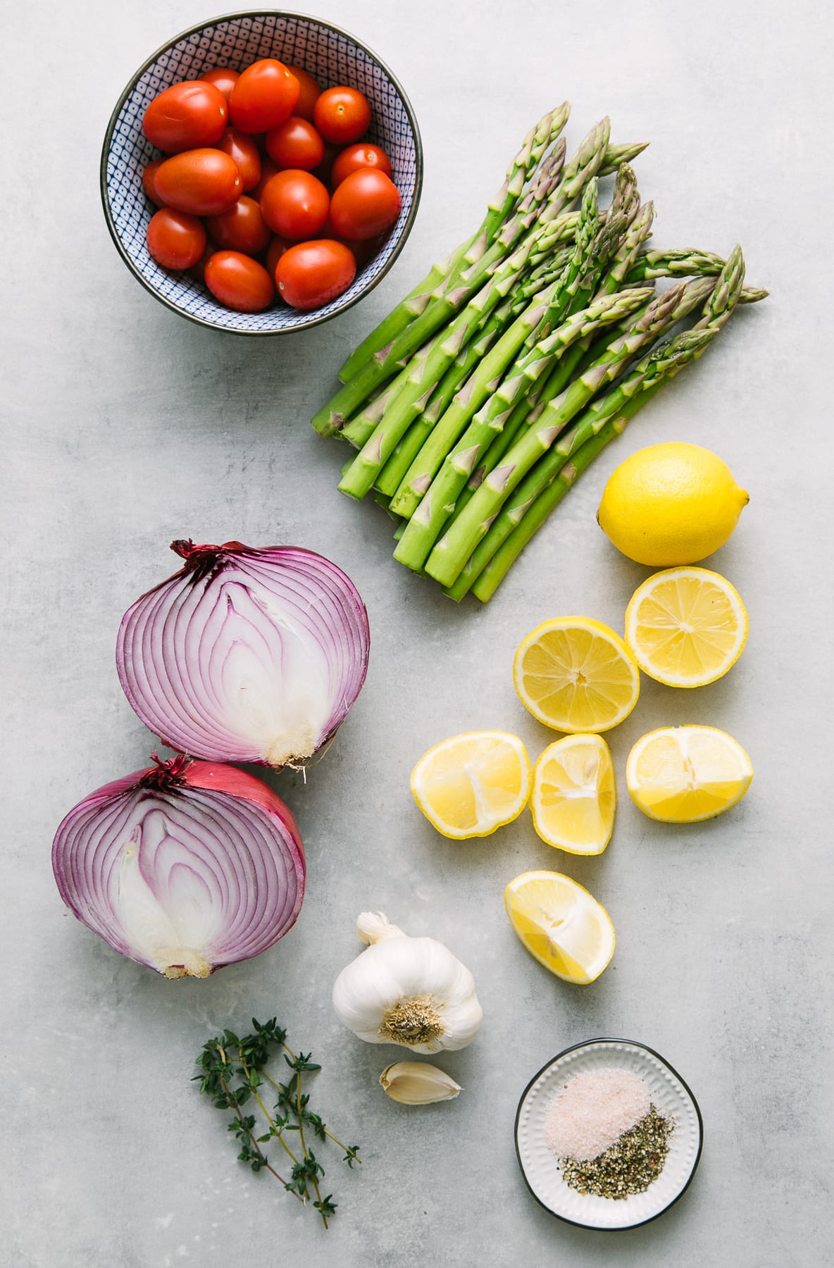 top down view of ingredients used to make skillet asparagus tomato and medley recipe.