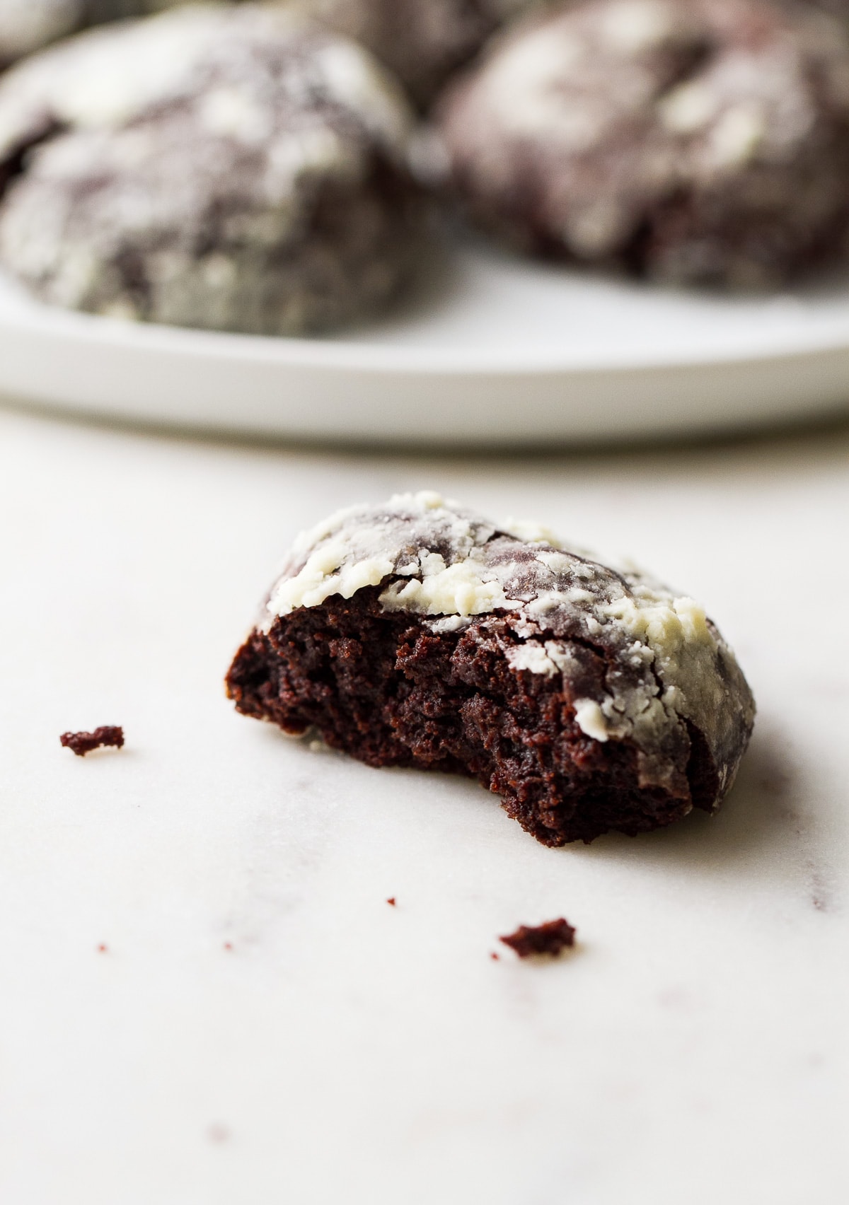 side angle view showing the center of a vegan chocolate stout crinkle cookie.