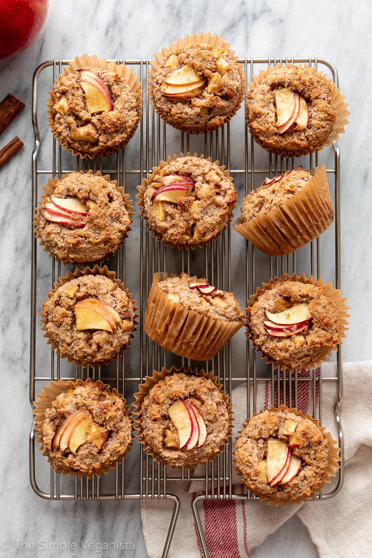 Almond flour apple muffins on a cooling rack.