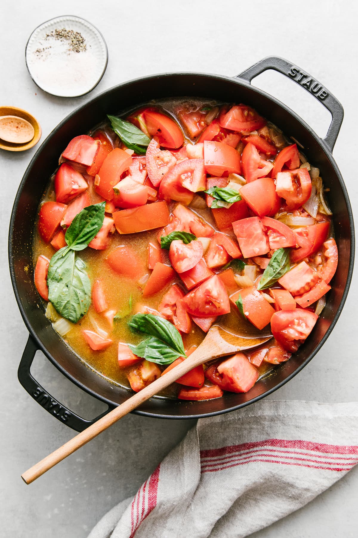 top down view of spicy tomato soup just before simmering on the stovetop.