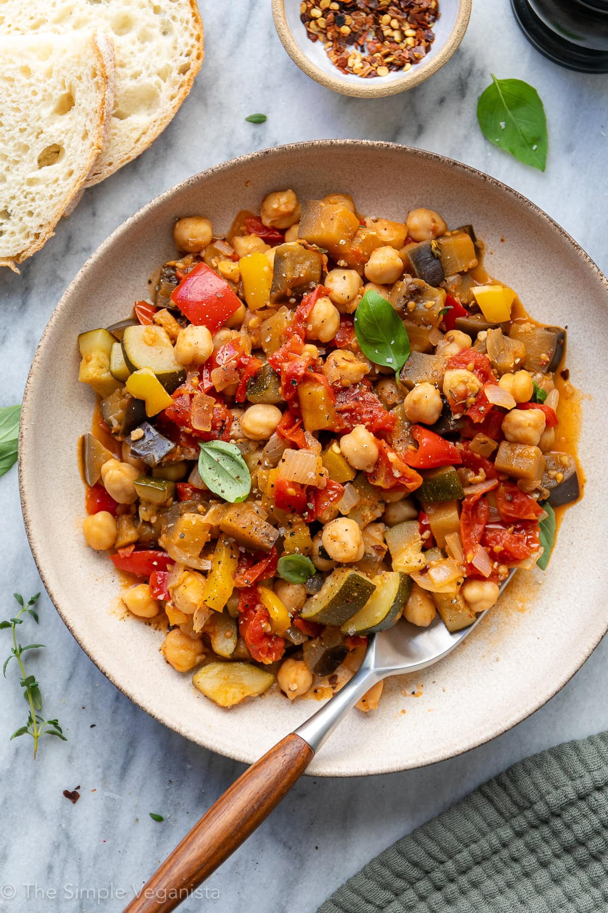 Close-up of chickpea ratatouille with tender vegetables and chickpeas.