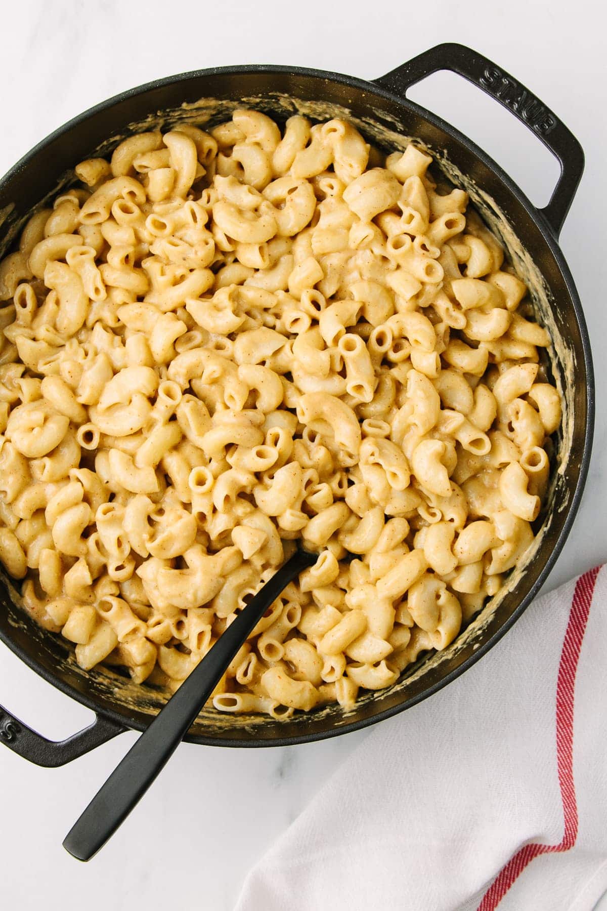 top down view of freshly spicy made vegan mac and cheese recipe with nutritional yeast.