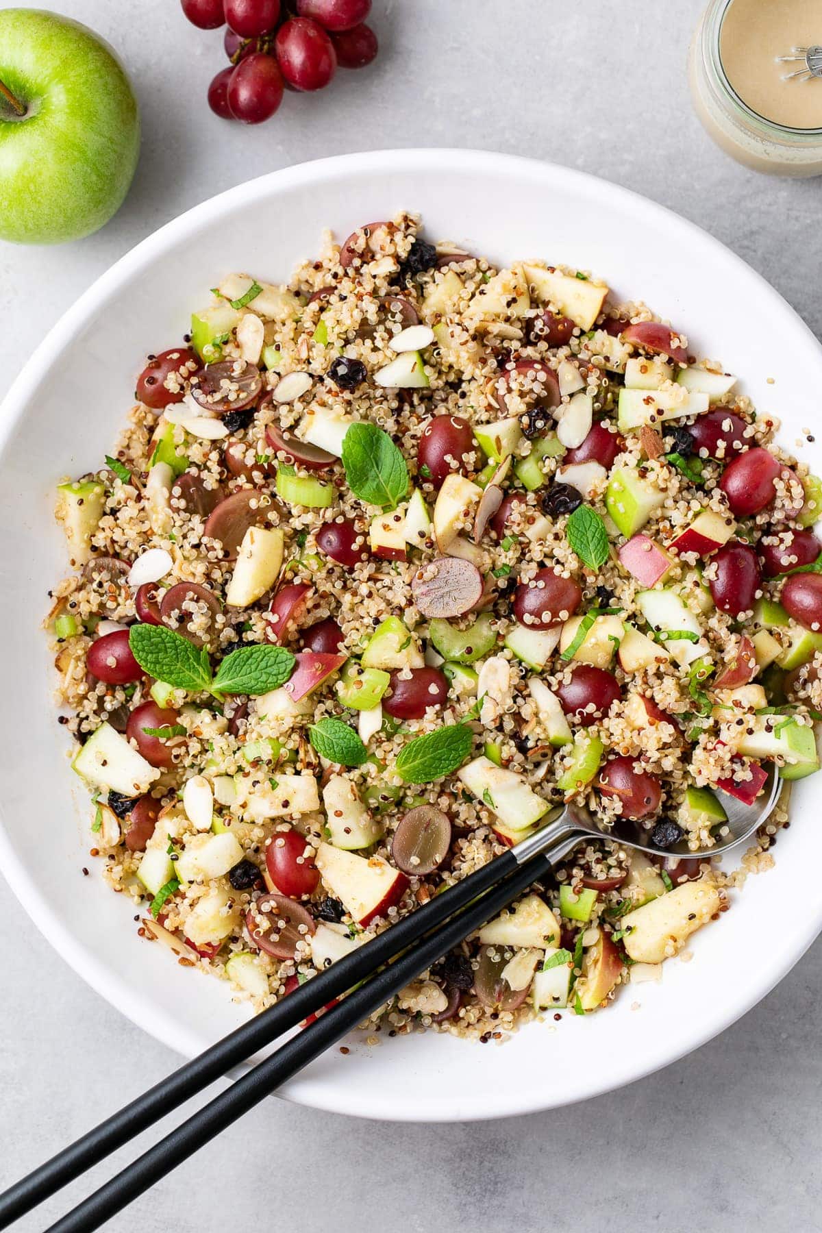 top down view of apple quinoa salad in a serving bowl.