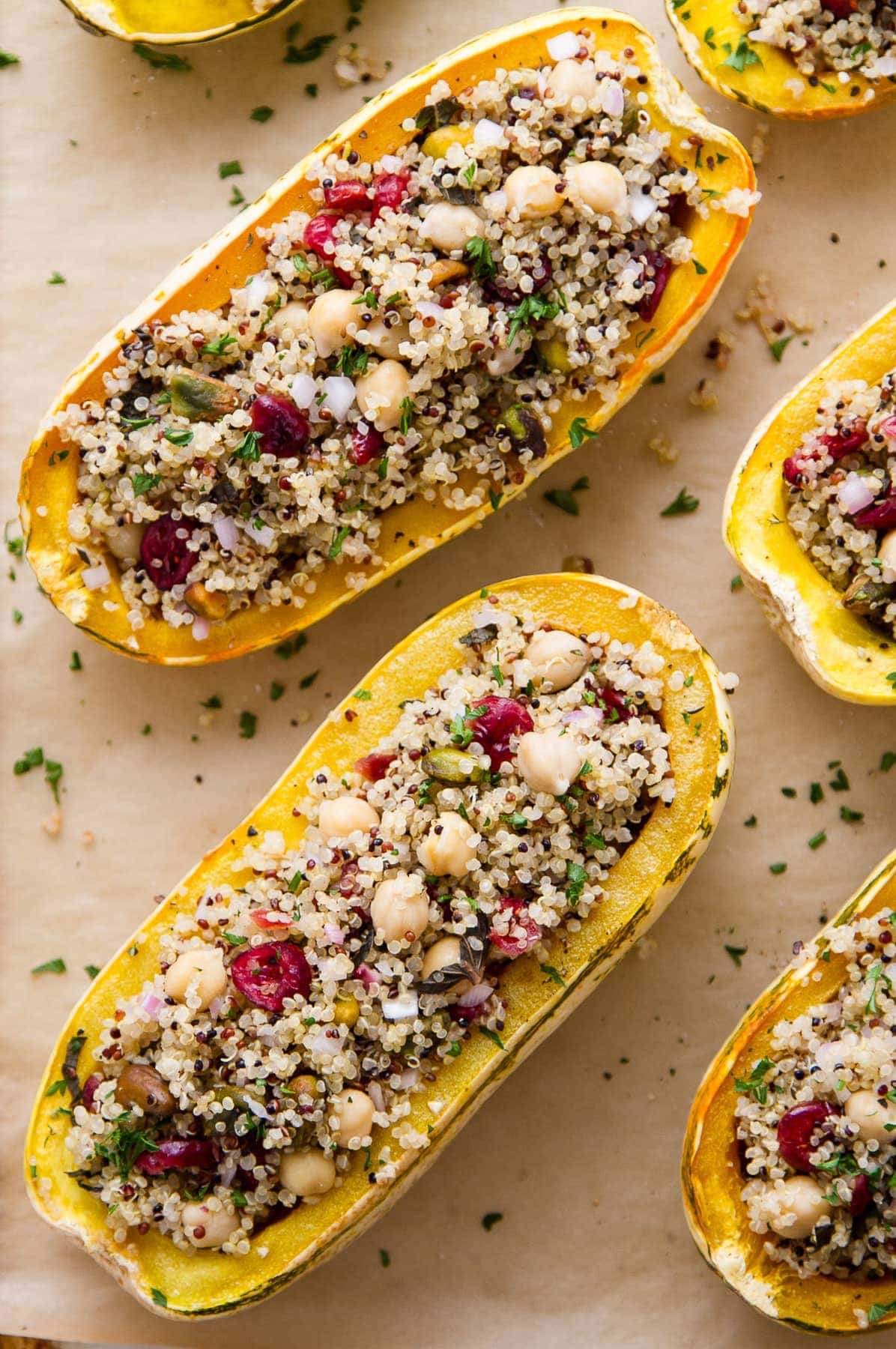 top down view of stuffed delicata squash with quinoa.