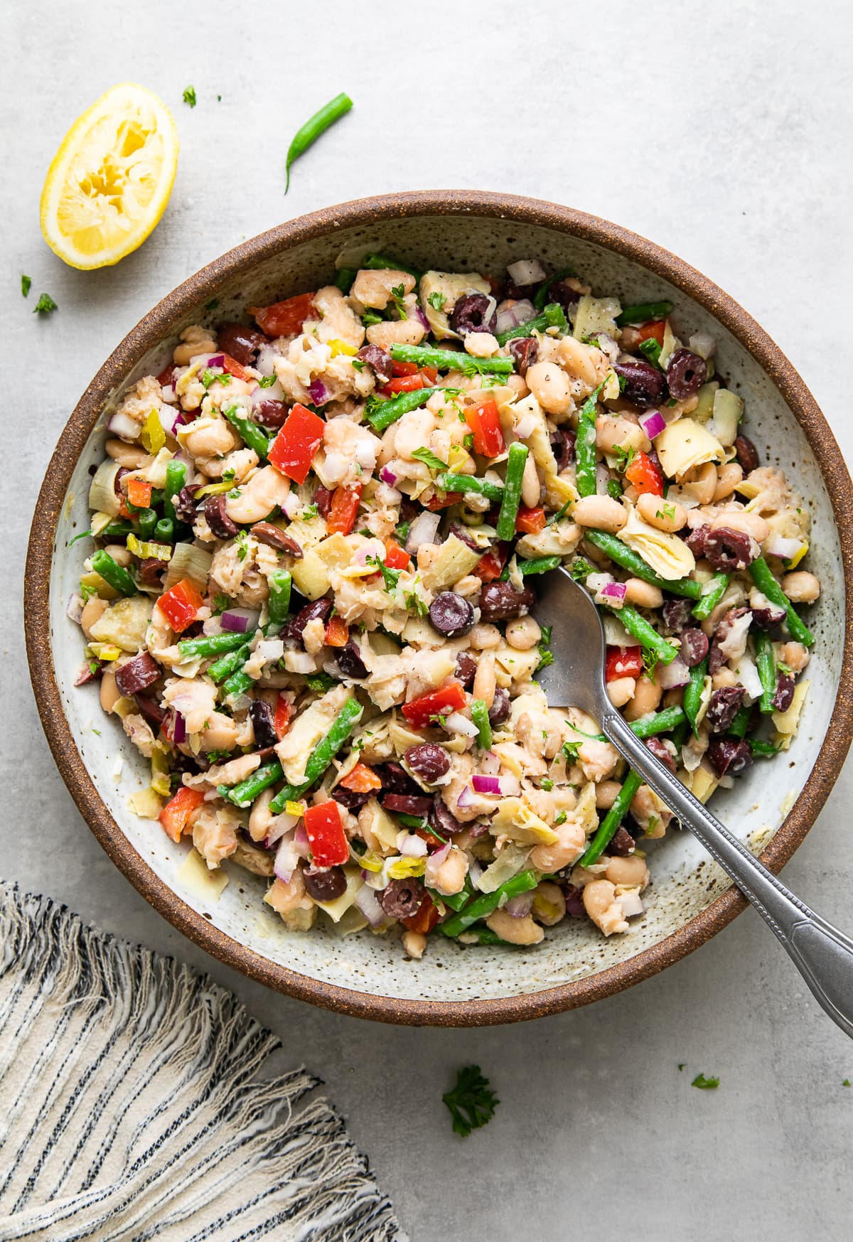 top down view of bowl with freshly make vegetarian nicoise salad for pan bagnat