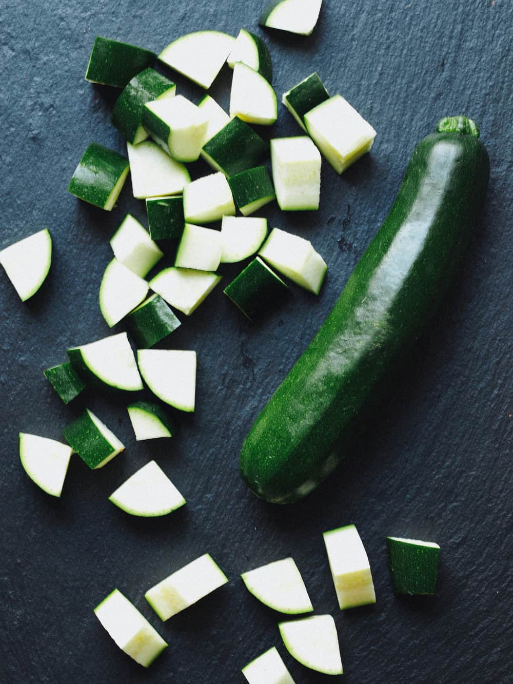 Top down view of prepped zucchini for soup.