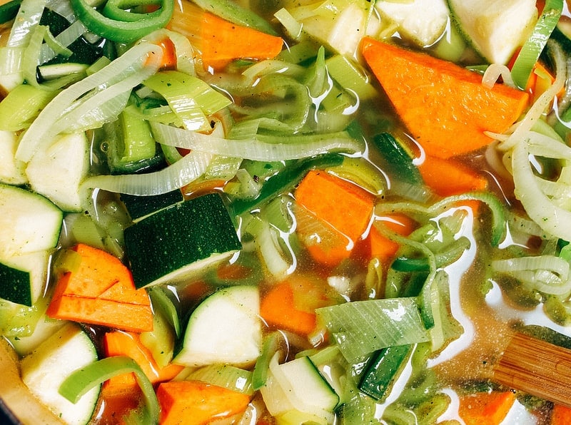 up close view of vichyssoise soup ingredients simmering.