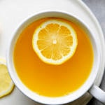 top down view of lemon ginger detox tea in a cup.
