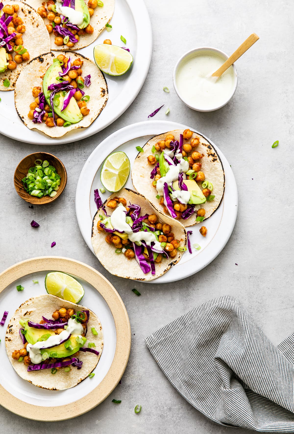 top down view of plates filled with chickpea tacos.