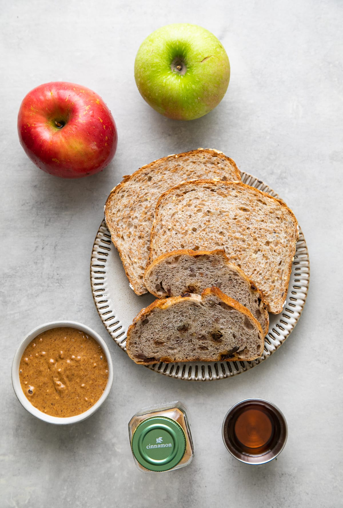 top down view of ingredients used to make peanut butter apple sandwich.