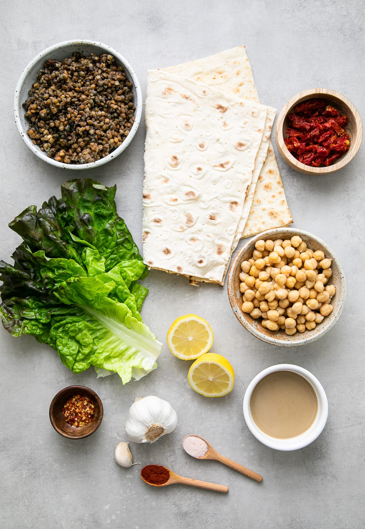 top down view of ingredients used to make lentil wrap with sun-dried tomato hummus.
