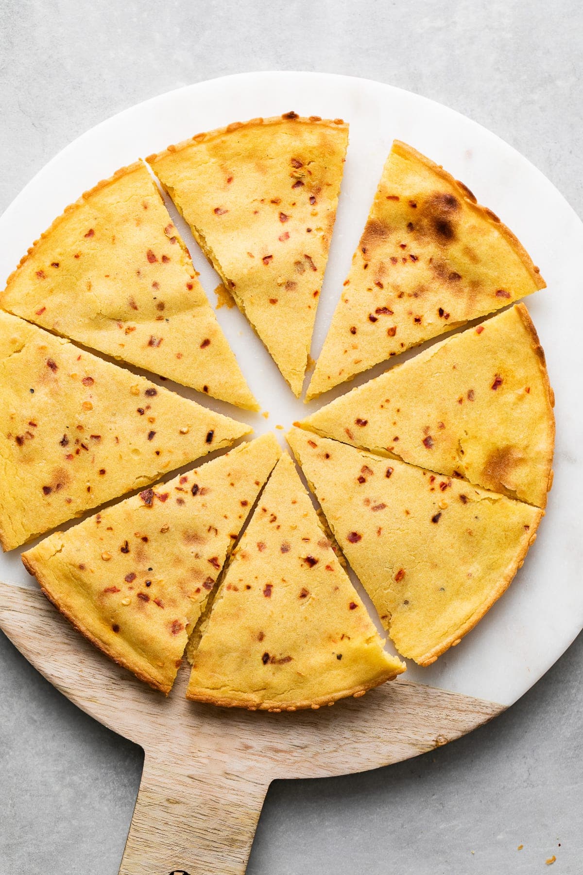 top down view of sliced socca flatbread.