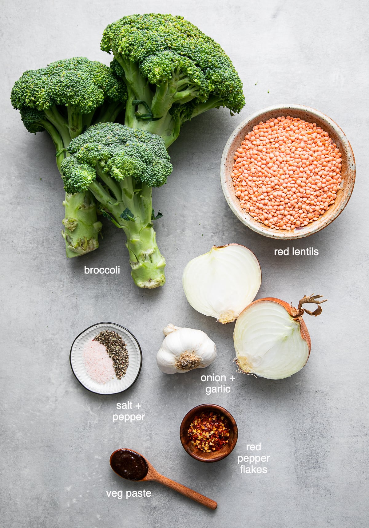 top down view of ingredients used to make creamy vegan broccoli red lentil soup recipe.