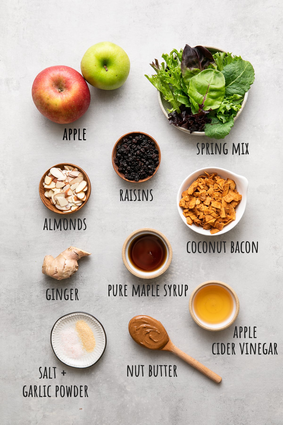 top down view of ingredients used to make apple coconut bacon salad recipe.