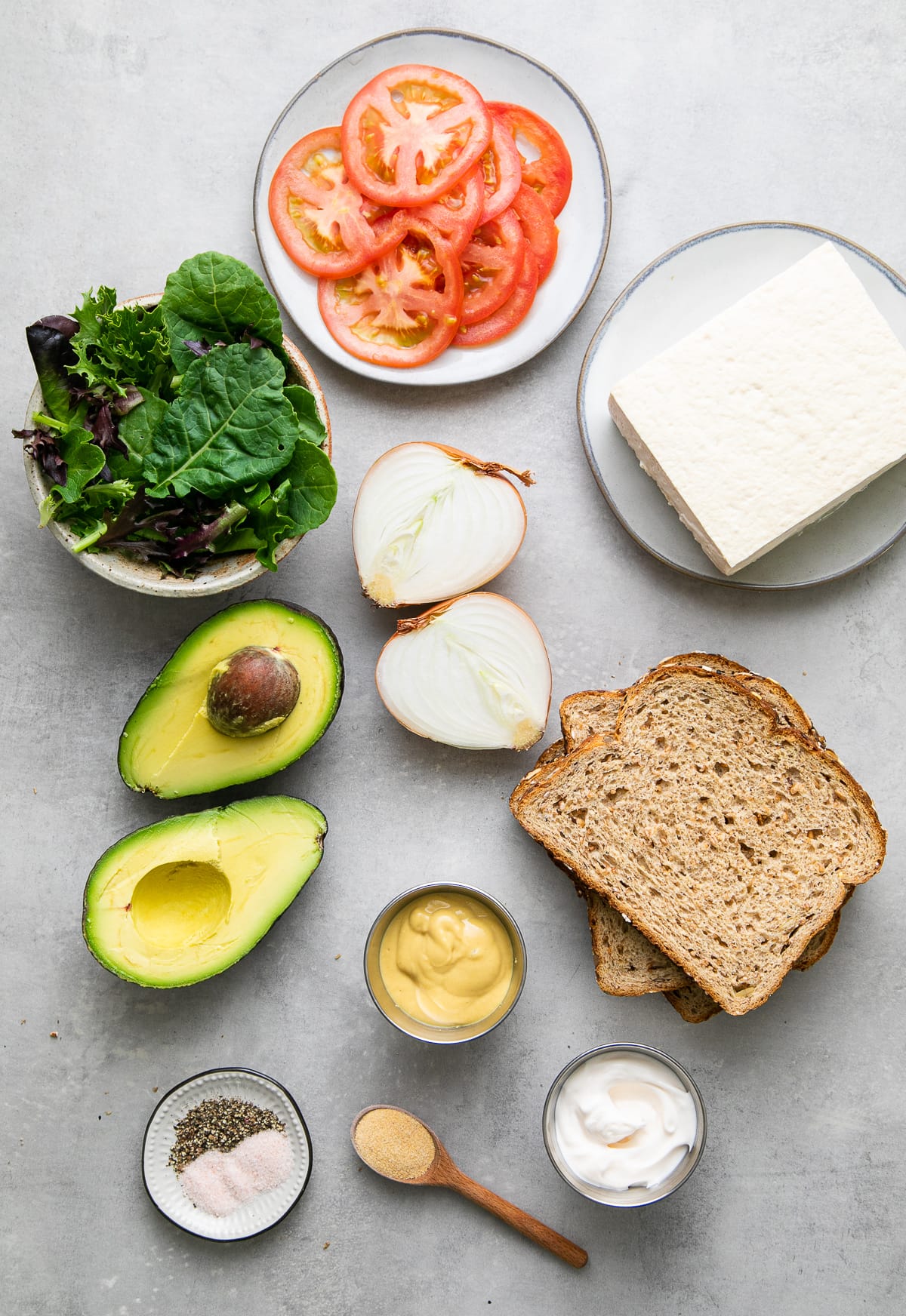 top down view of ingredients used to make the best tofu avocado sandwich.