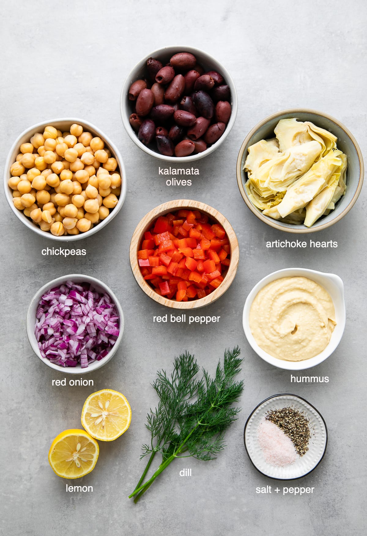 top down view of ingredients used to make mashed Mediterranean chickpea salad.