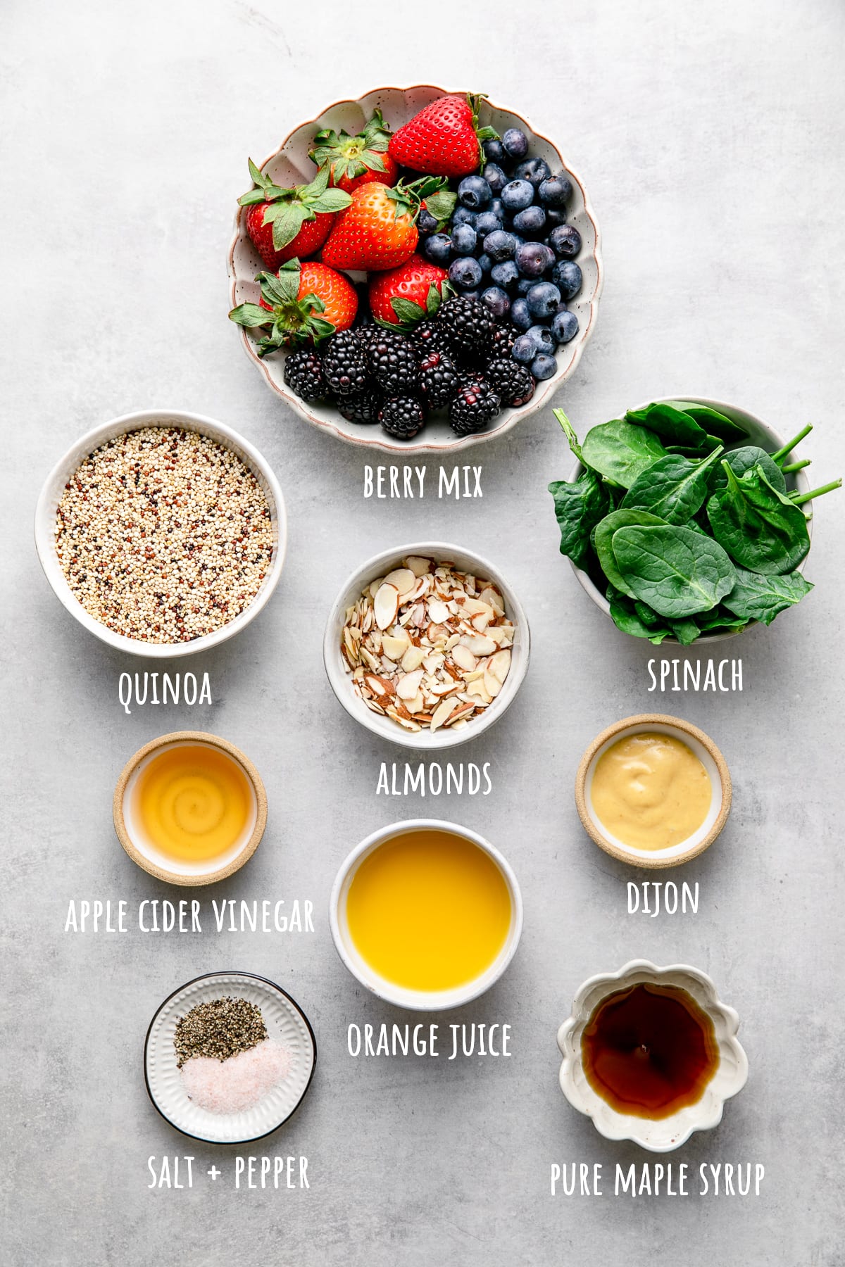 top down view of ingredients used to make berry spinach quinoa salad.