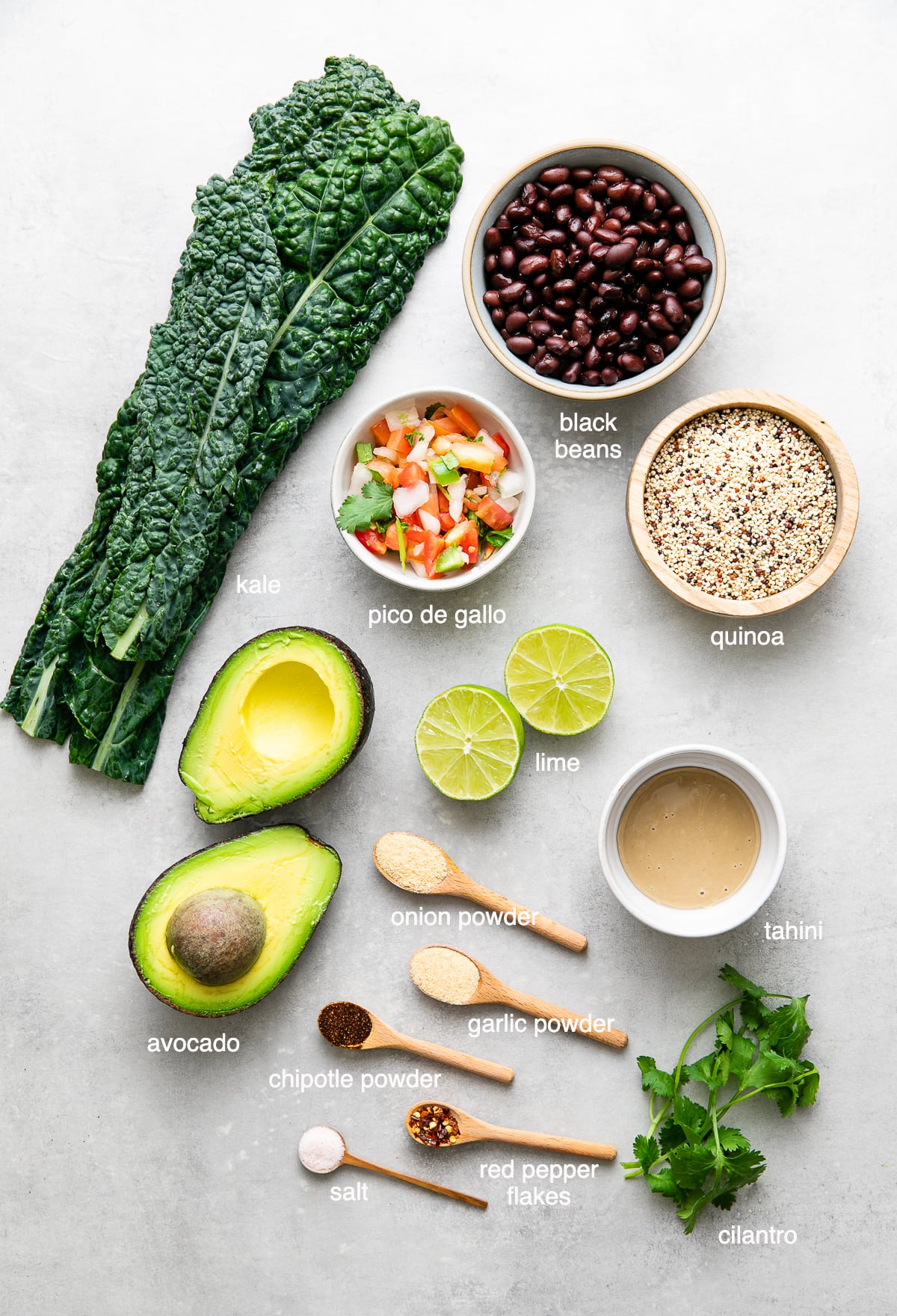 top down view of ingredients used to make black bean burrito bowls.