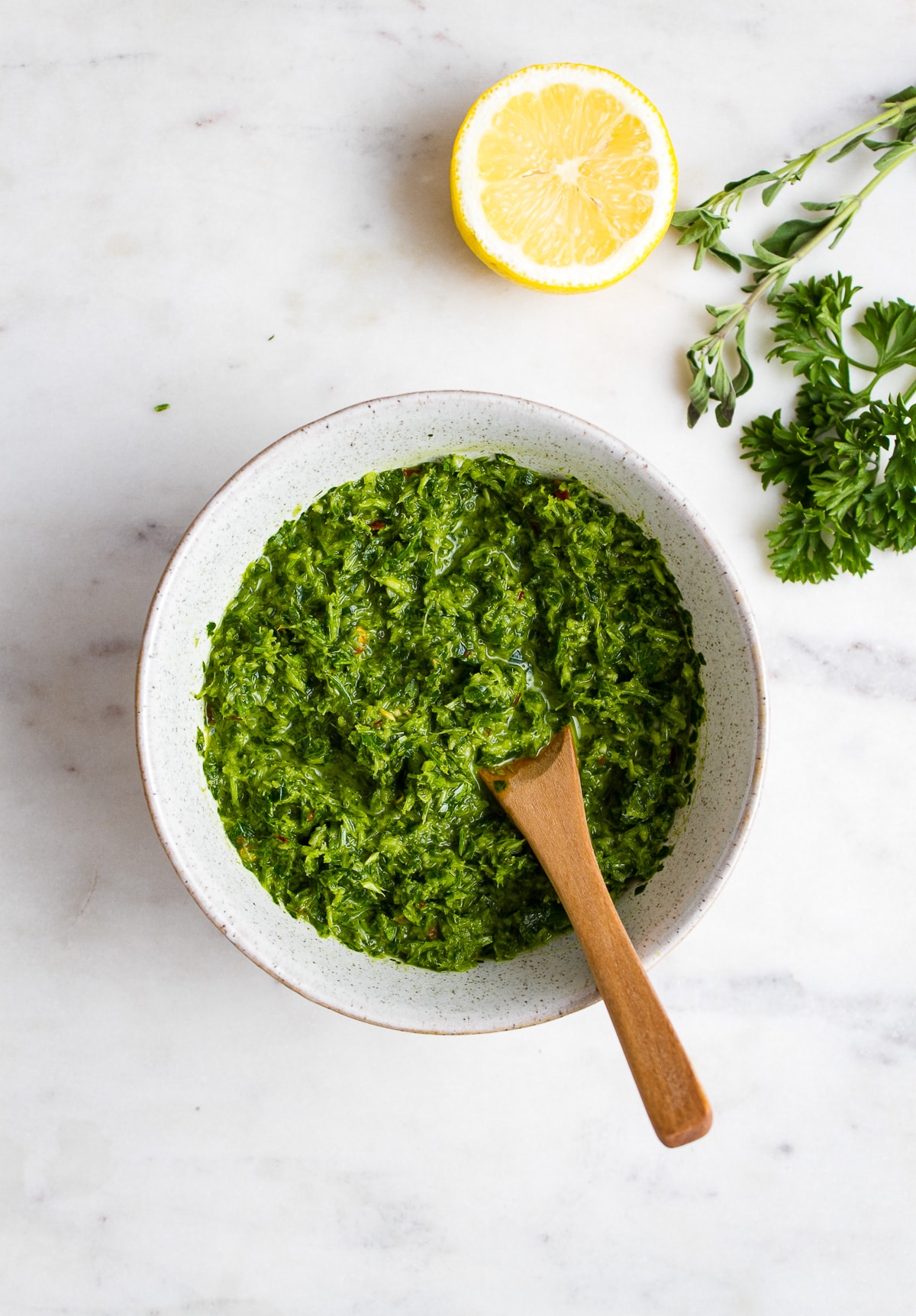 top down view of a small bowl with homemade chimichurri.