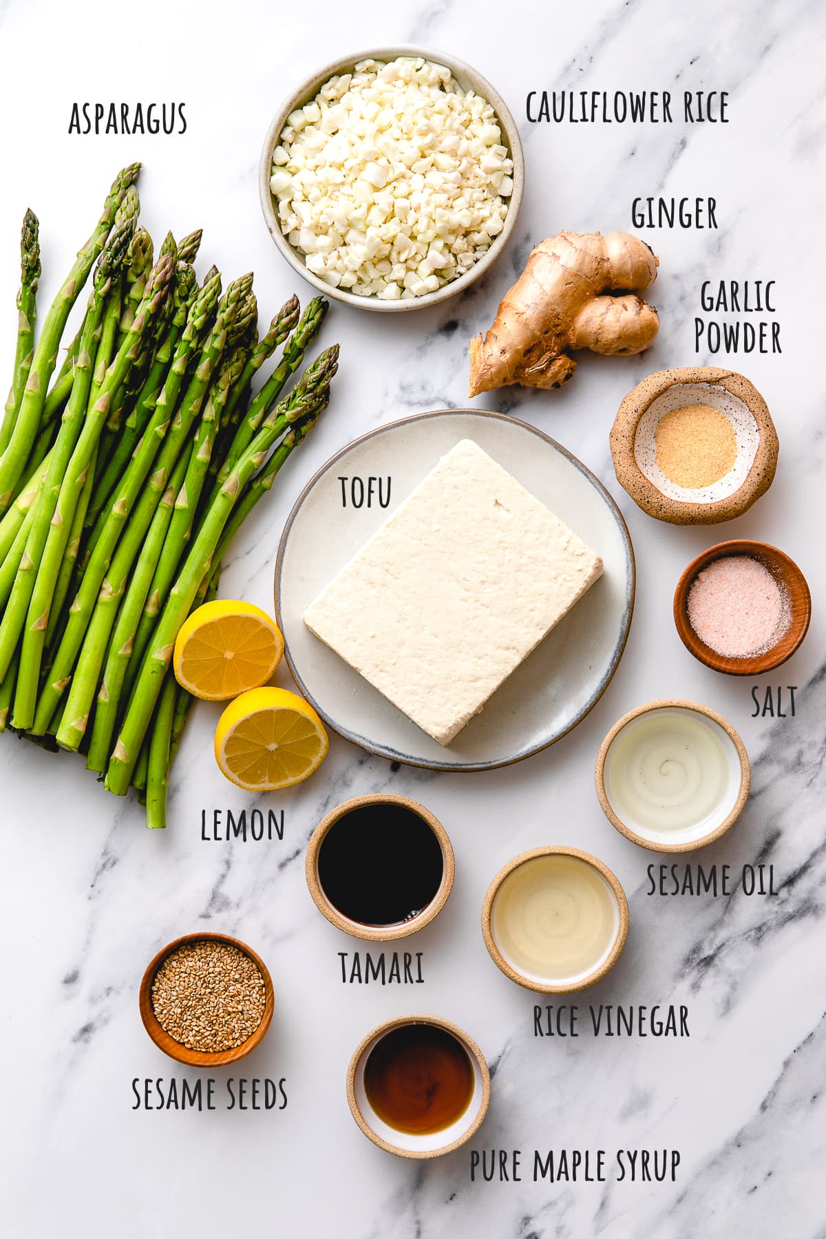top down view of ingredients used to make grilled tofu and asparagus with ginger cauliflower rice.