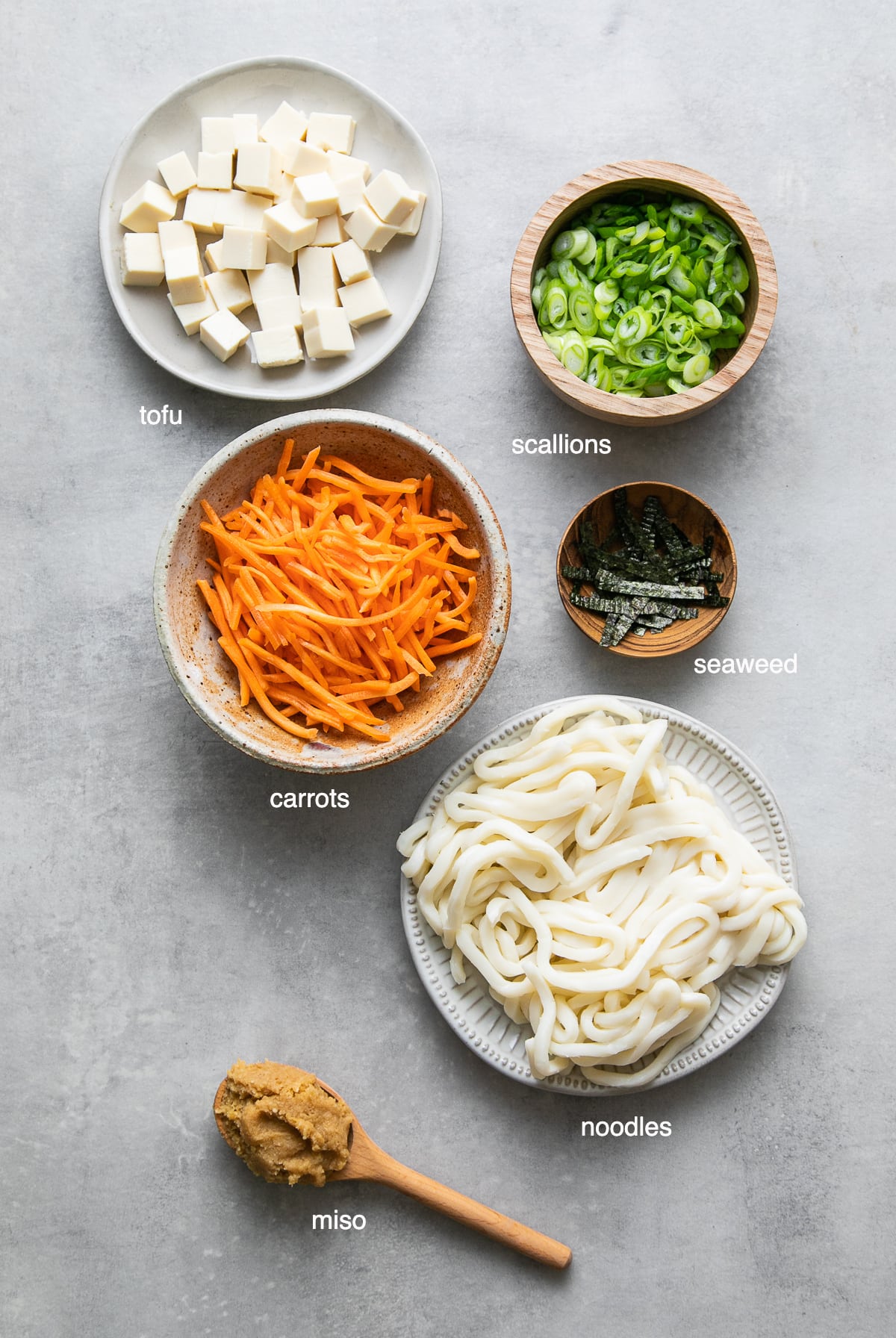 top down view of ingredients used to make miso noodle soup recipe with tofu.