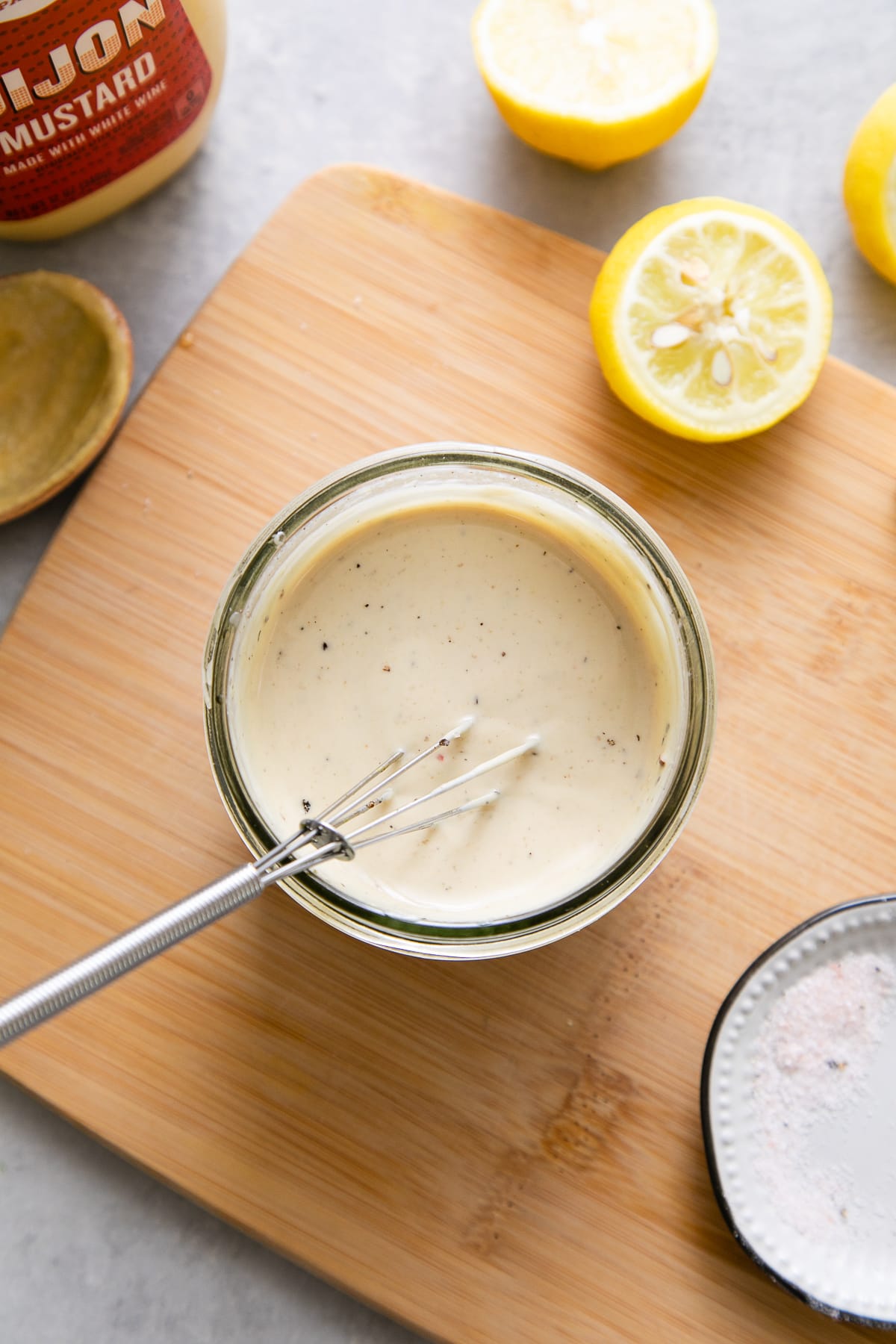 top down view showing the process of making creamy vegan potato salad dressing.