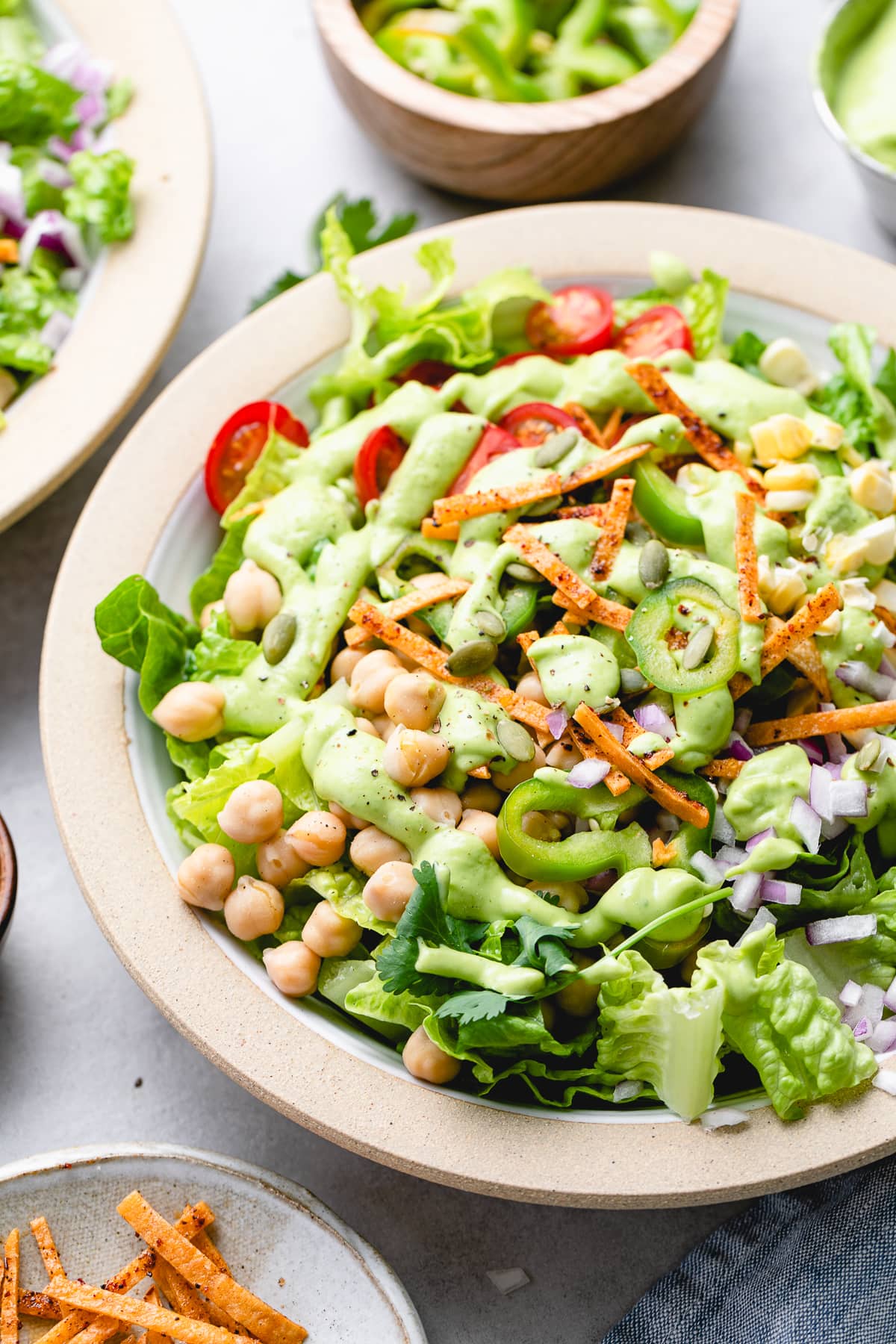 side angle view of southwestern chickpea salad with avocado dressing.