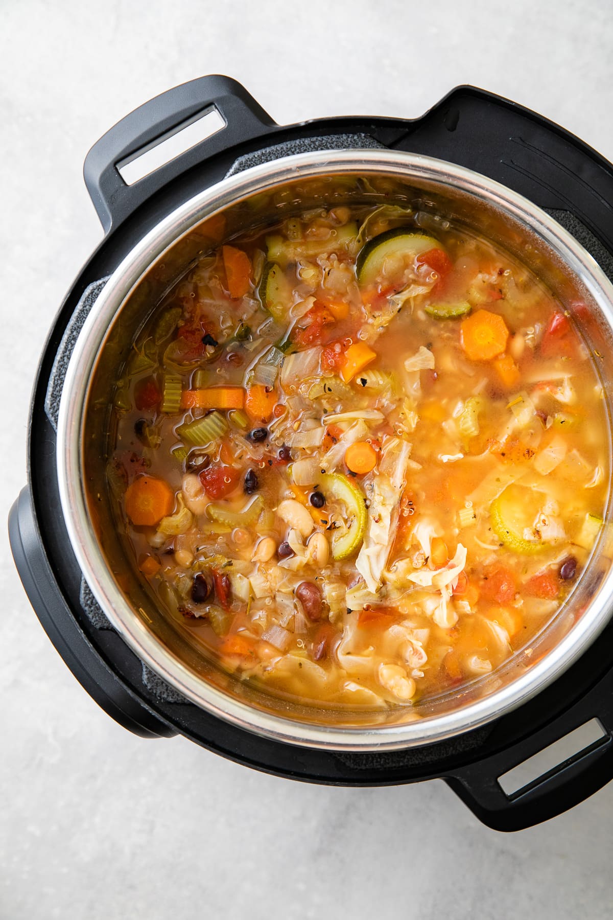 top down view of freshly made vegetable quinoa soup cooked in an Instant Pot.