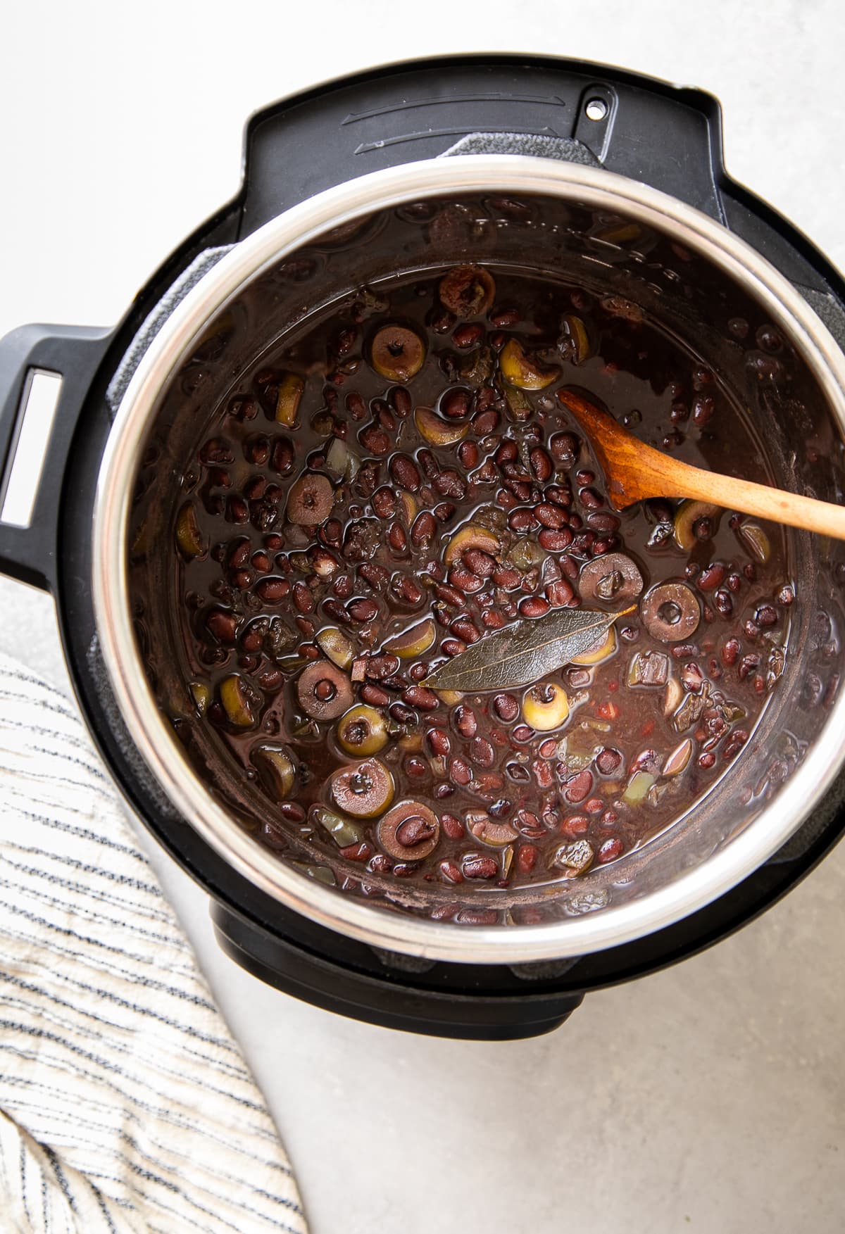 top down view of freshly made cuban black beans in an instant pot.