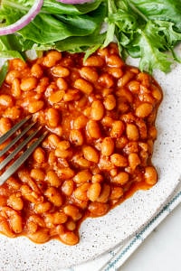baked beans on a plate with fork