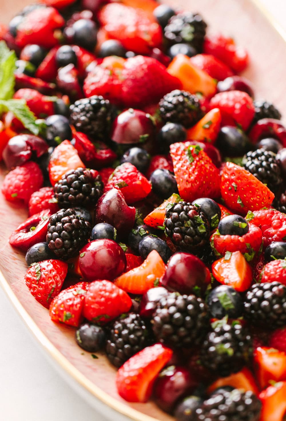 angled view of summer cherry berry fruit salad