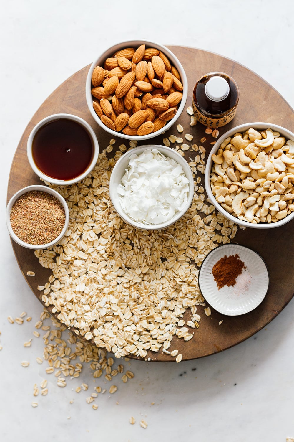 ingredients for granola on a wooden board