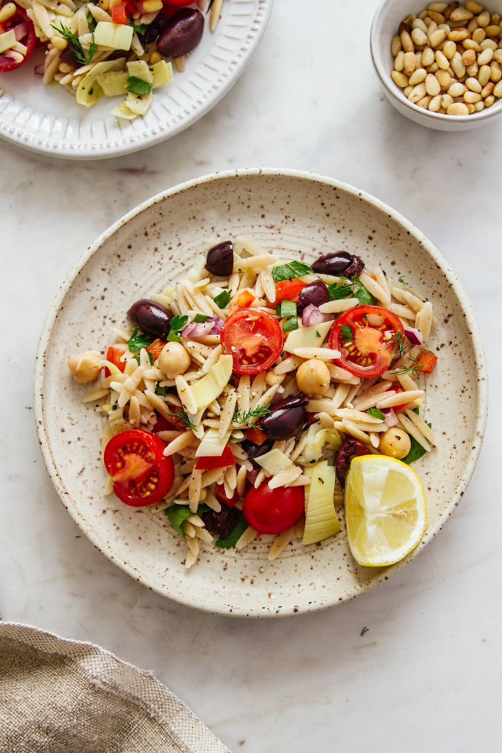 serving of mediterranean orzo salad on a small plate